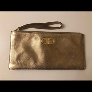 Salvatore Ferragamo gold wristlet